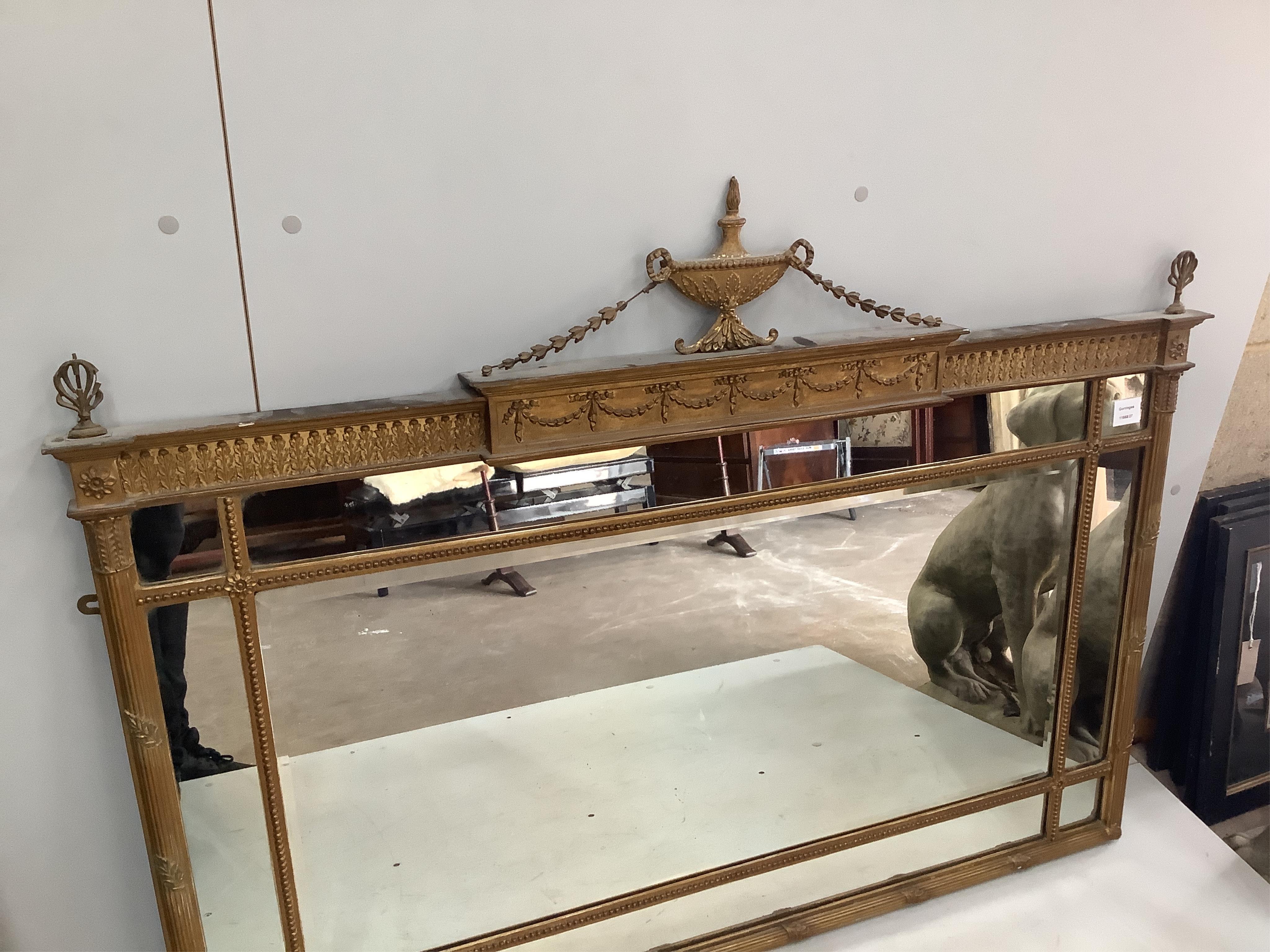 An Adam design gilt framed overmantel mirror, width 126cm, height 92cm. Condition - fair